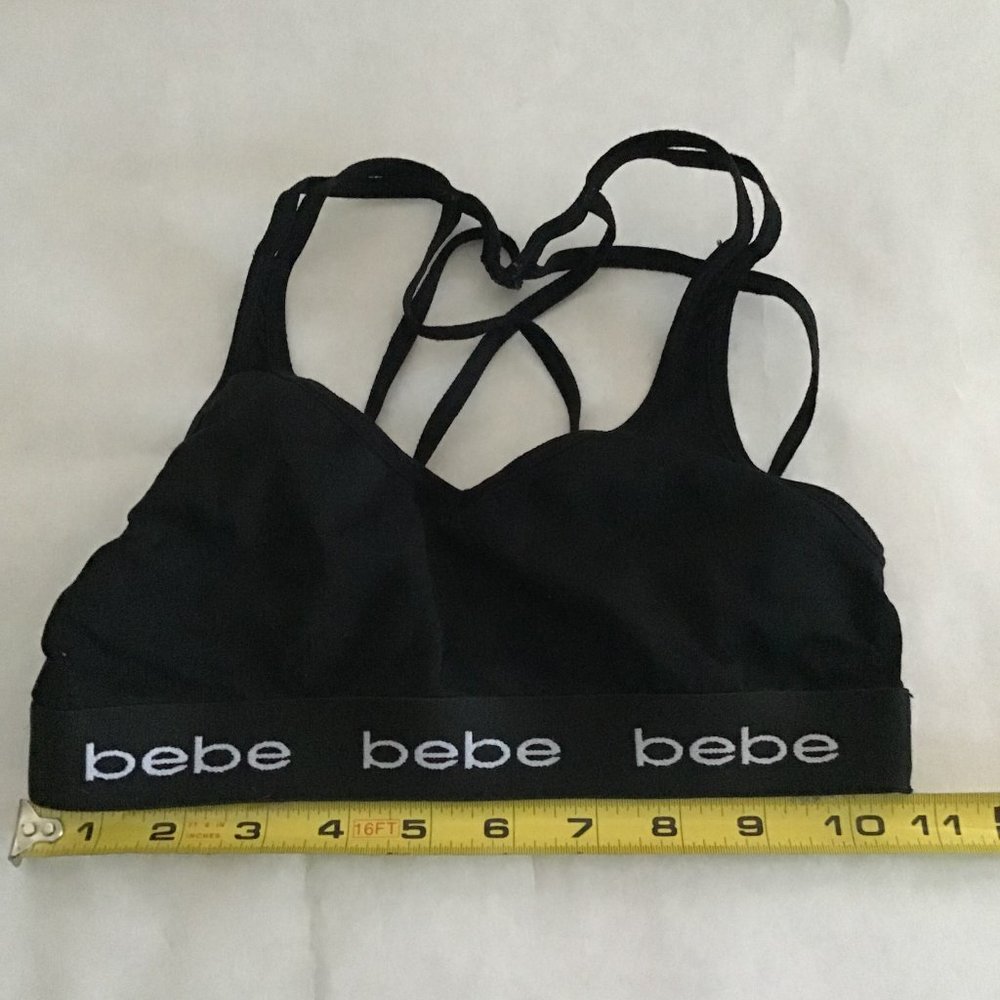 bebe black sports bra, no size tag- see picture for measurements